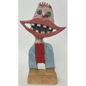 Grinedreng med gr�nne �jne, skulptur, ca. 22 cm