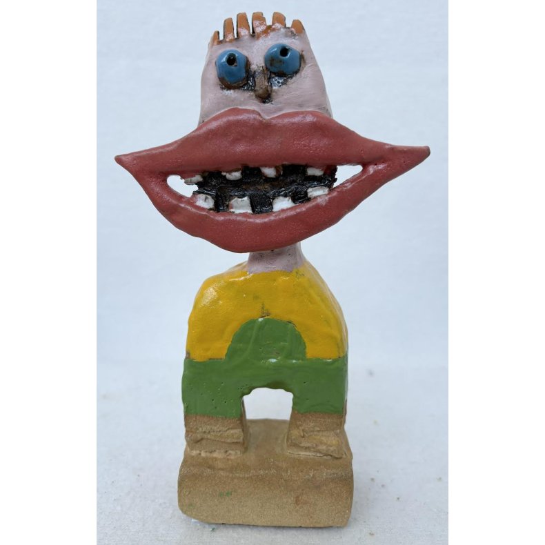 Grinedreng med bl� �jne, skulptur, ca. 22 cm