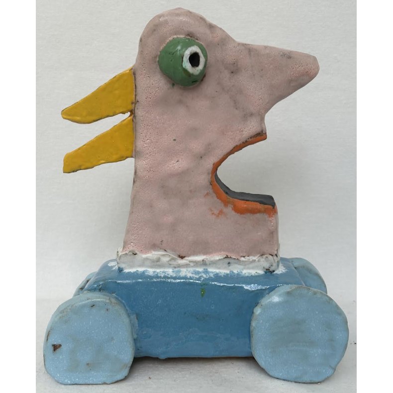 Stor bilist i bl� bil, skulptur, ca. 31x26x13 cm