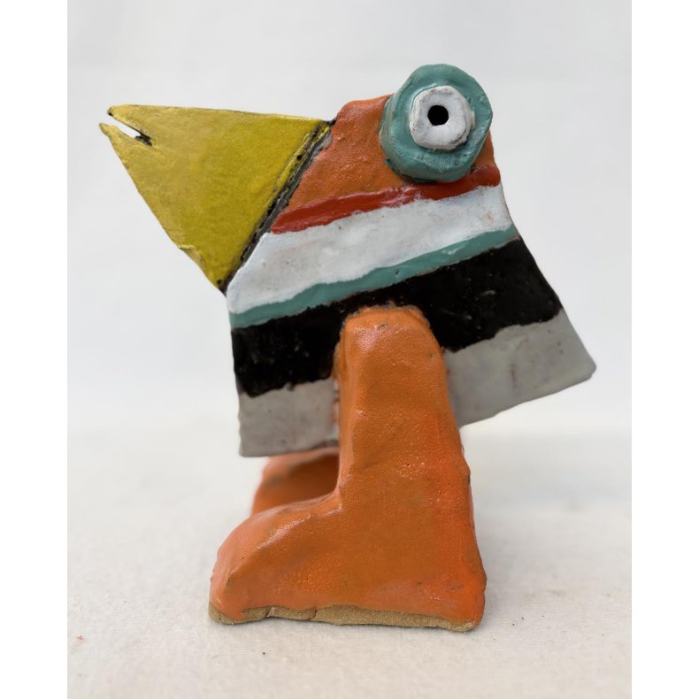 Bredn�b med orange ben, skulptur, ca. 18x21 cm