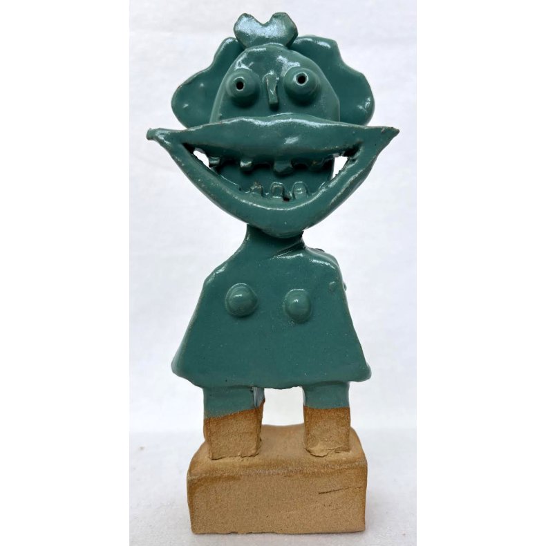 Grinepige, skulptur, petroleumsbl, H. ca. 17 cm